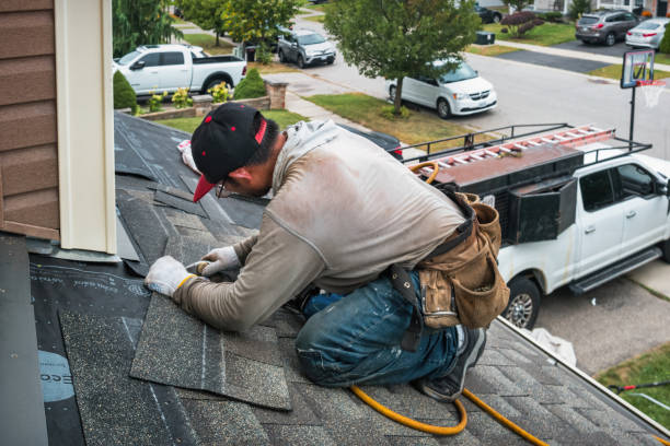 Professional Roofing technician working in North Hampton, NH
